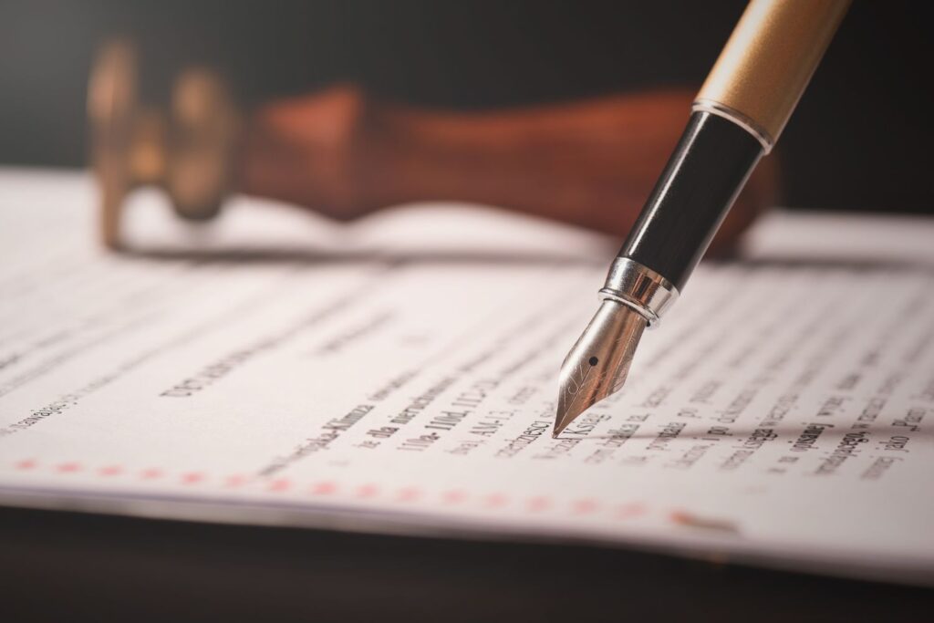fountain pen on legal document