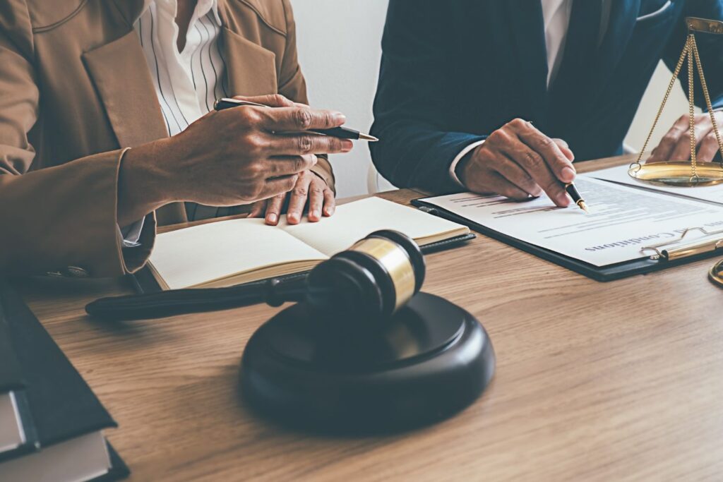 lawyers discussing a contract