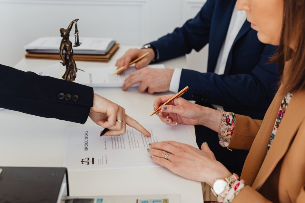 signing a divorce decree with legal counsel